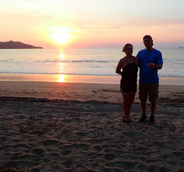 Steve and Nikki Page on Tamarindo Beach in Costa Rica at Sunset