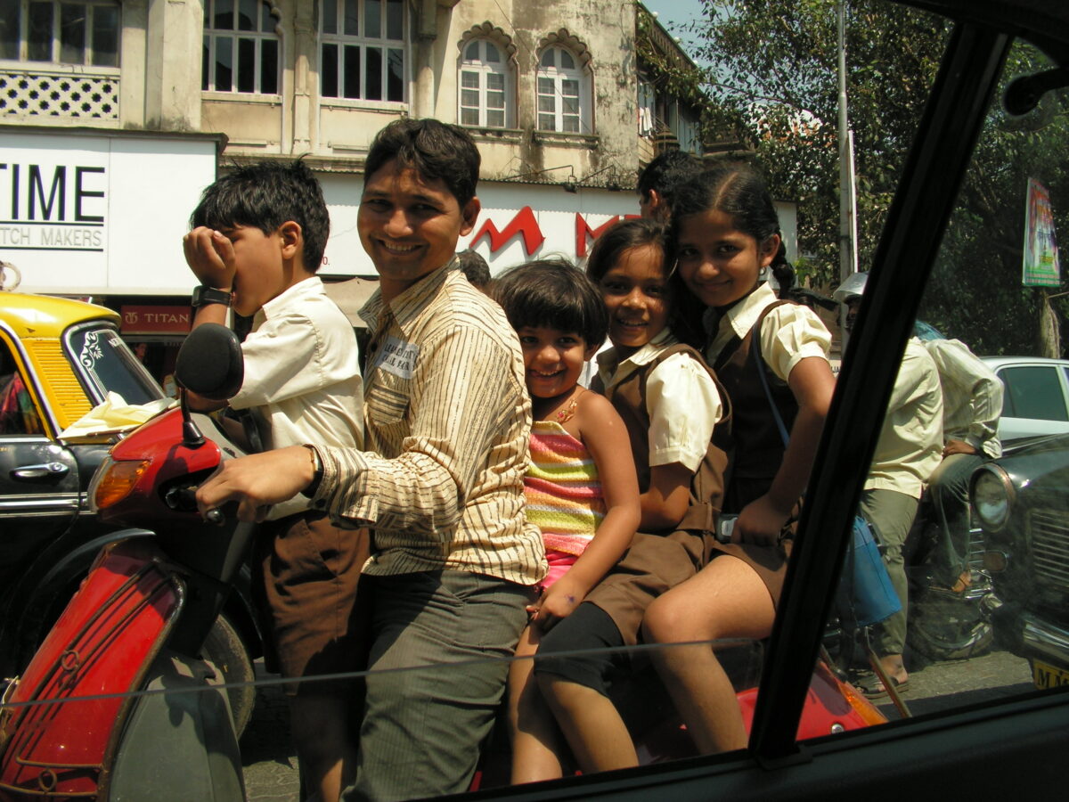 India motorcycle scooter with five kids riding: Photo by Steve Page