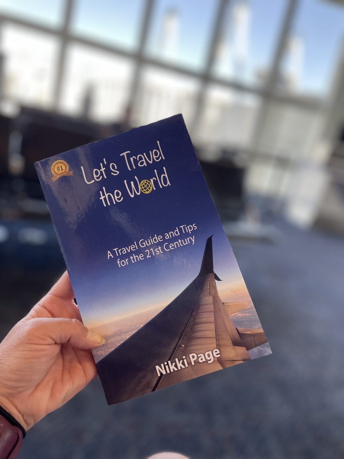 Let's Travel the World, Las Vegas Airport, Travel Author Nikki Pagr
