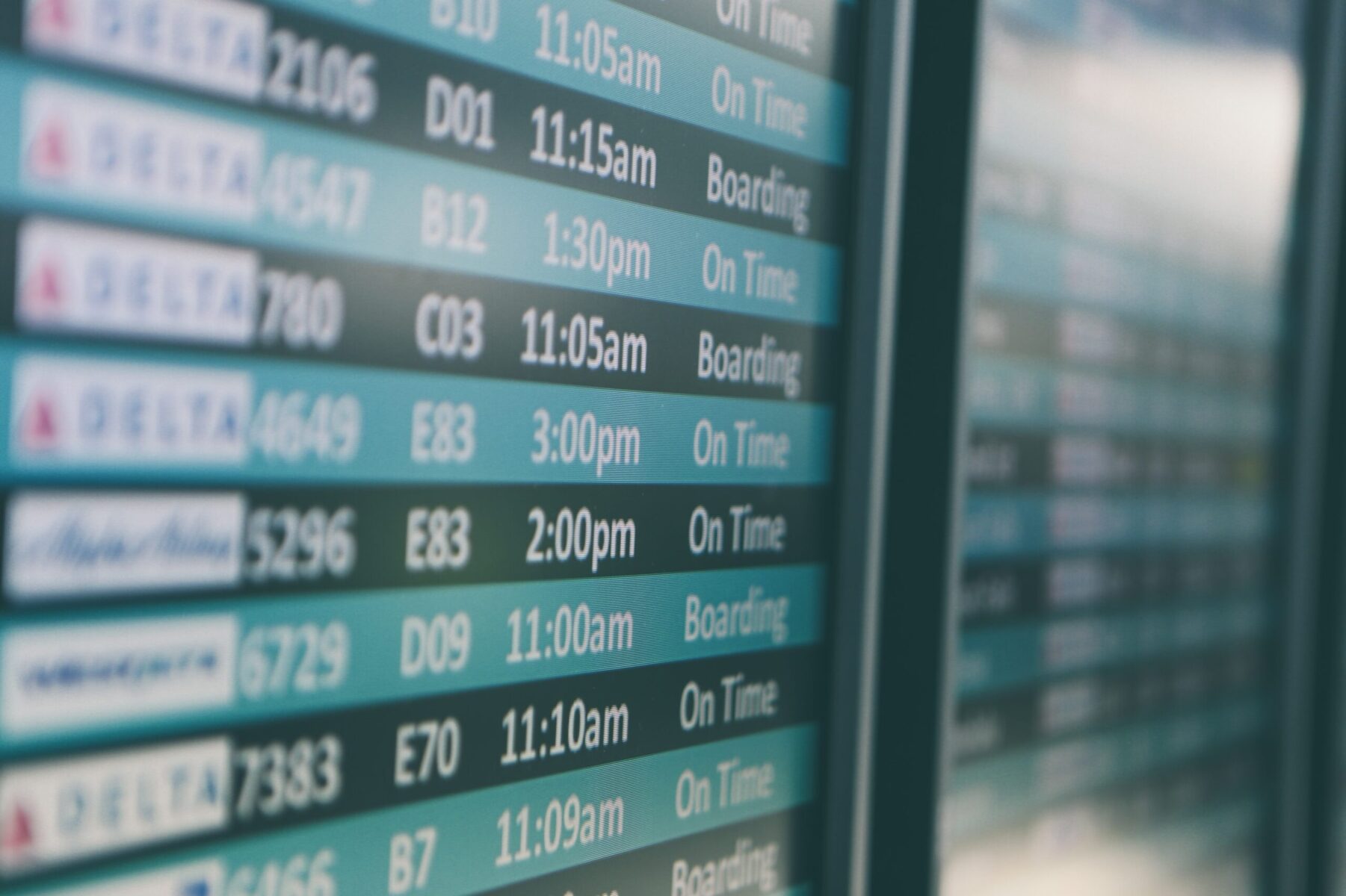 Airport Departure board: Photo by Matthew Smith on Unsplash