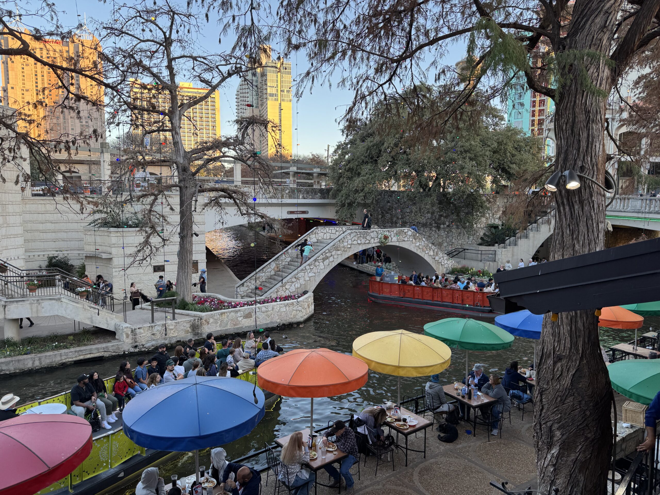 San Antonio River, River Walk, Colorful Umbrellas, River Boats, United States, Photo by Travel Author Nikki Page